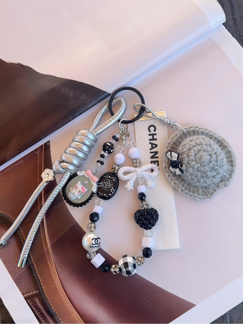 Authentic CHANEL Ribbon with unbranded Bag Charm - hello Kitty black & white